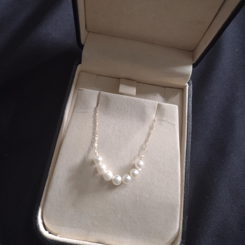 Rogers and Holland's Vintage Add a Pearl Necklace